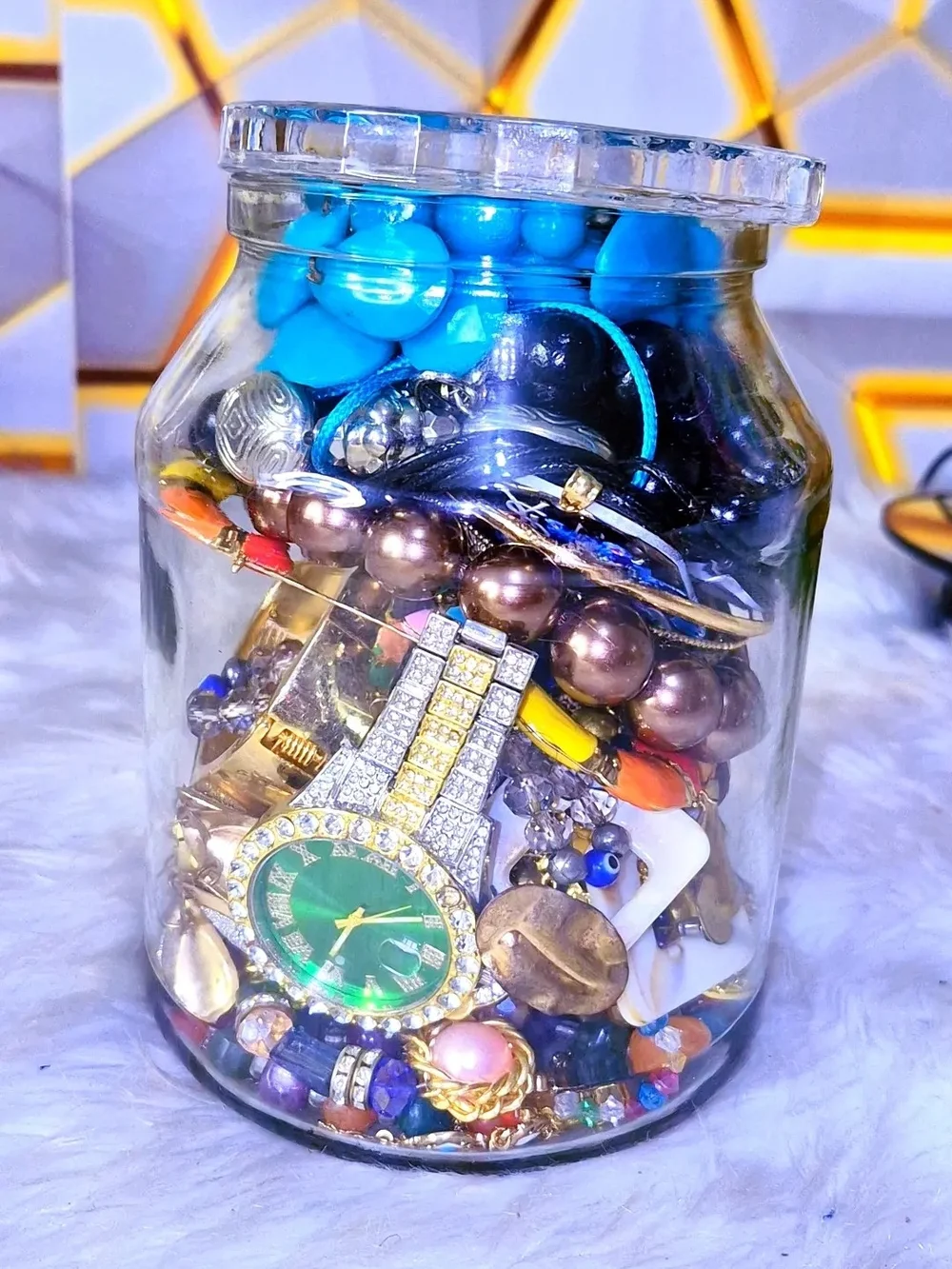 Decorative Glass Jar Filled with Assorted Blue and Multicolor Jewelry Accents